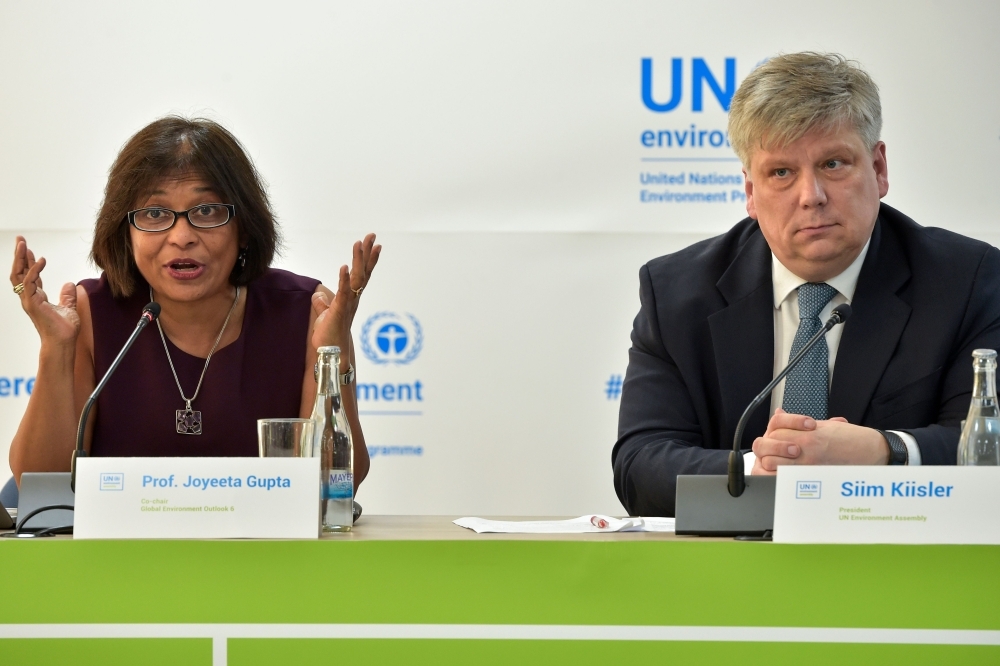 Global Environment Outlook (GEO) co-chair Joyeeta Gupta, left, sits next to Estonian Environment Minister and President of the UN Environment Assembly Siim-Valmar Kiisler, speaks during a press conference after the opening plenary session of the 4th UN Environment Assembly at the UN headquarters in Nairobi on Wednesday. — AFP