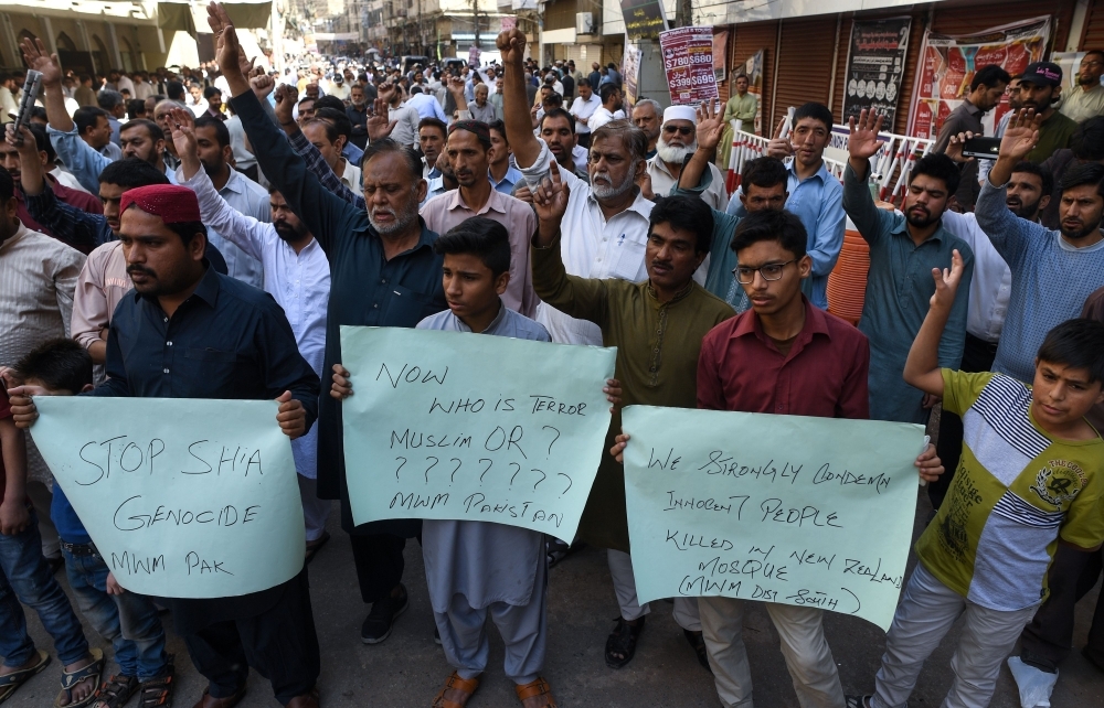 Pakistani activists of the Majlis Wahdat-e-Muslimeen (MWM) political organization protest against the attacks on two mosques in New Zealand, in Karachi on Friday. — AFP