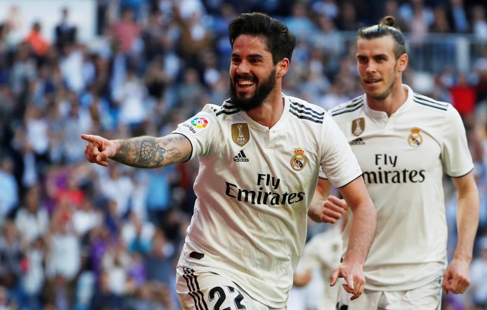 Real Madrid's Isco celebrates scoring against Celta Vigo during their La Liga Santander match at Santiago Bernabeu, Madrid, Saturday. — Reuters