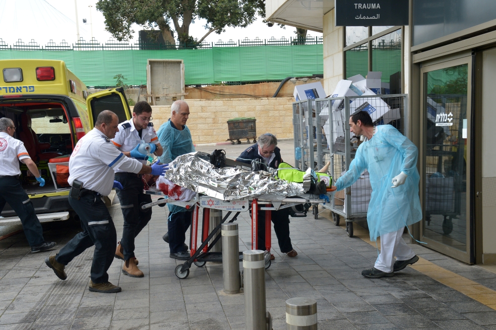 An injured person is rushed to a shospital, following an incident at the entrance to the Jewish settlement of Ariel in the occupied West Bank, in Petach Tikva, Israel, Sunday — Reuters