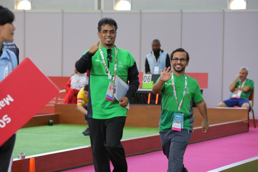 Rayed Al-Oufi with head coach Abdulrahman Al-Hujaili