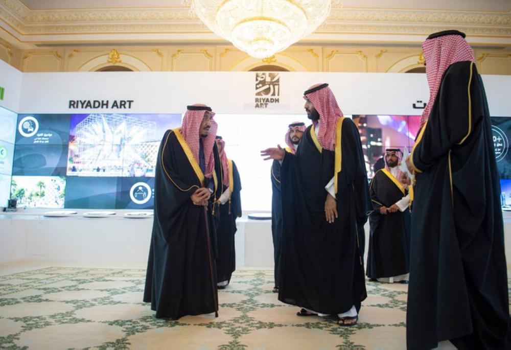 Custodian of the Two Holy Mosques King Salman being briefed by Crown Prince Muhammad Bin Salman, deputy premier and minister of defense, on the salient features of the four mega projects during an inauguration ceremony in Riyadh on Tuesday. — SPA
