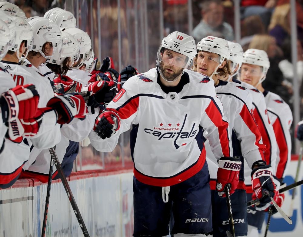 Brett Connolly (front) of the Washington Capitals celebrates his goal with teammates on the bench during their NHL game against the New Jersey Devils at Prudential Center in Newark, New Jersey, Tuesday. — AFP 