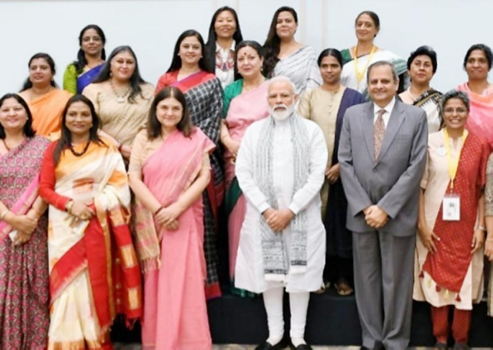 Indian President Ram Nath Kovind conferring the award to Manju, and  below, Prime Minister Narendra Modi meeting with awardees. 