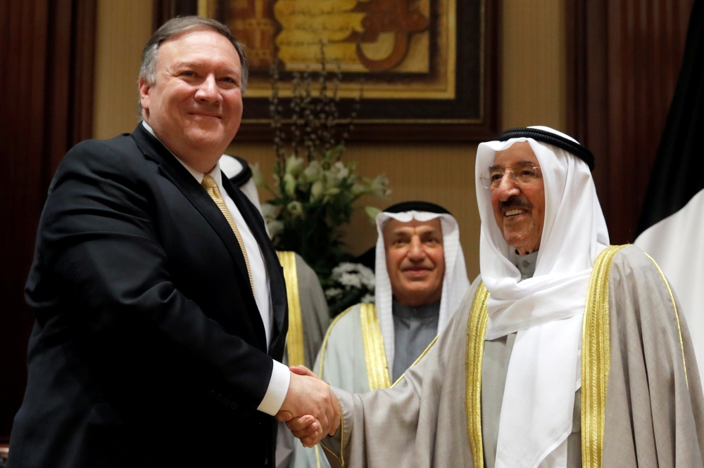 US Secretary of State Mike Pompeo shakes hands with Kuwait's Emir Sheikh Sabah Al-Ahmad Al-Jaber Al-Sabah, in Kuwait City, Kuwait, Wednesday. — Reuters