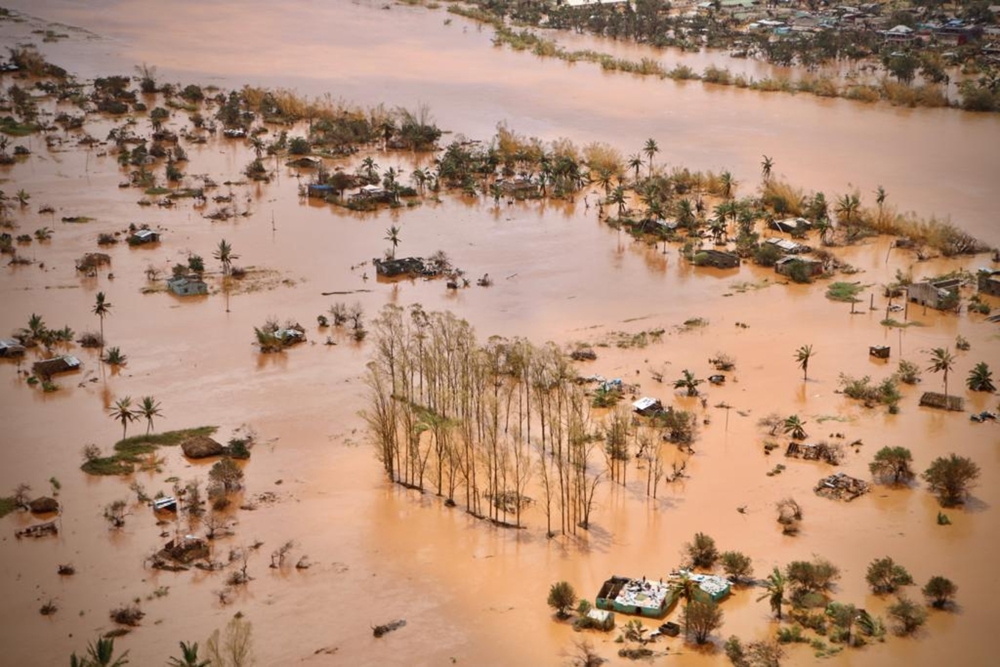 An aerial view shows the flooded plane surrounding Beira, central Mozambique, on Wednesday after the passage of the cyclone Idai. — AFP