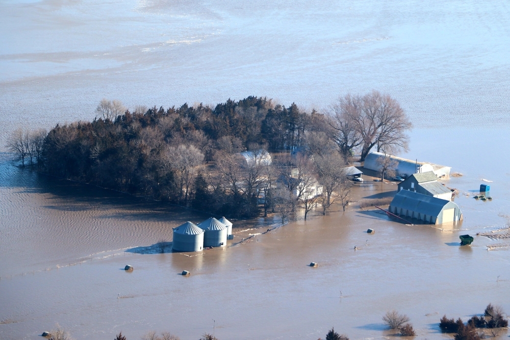 This image released by the Office of Nebraska Governor Pete Ricketts shows a flooded farm in Nebraska on March 15, 2019. — AFP