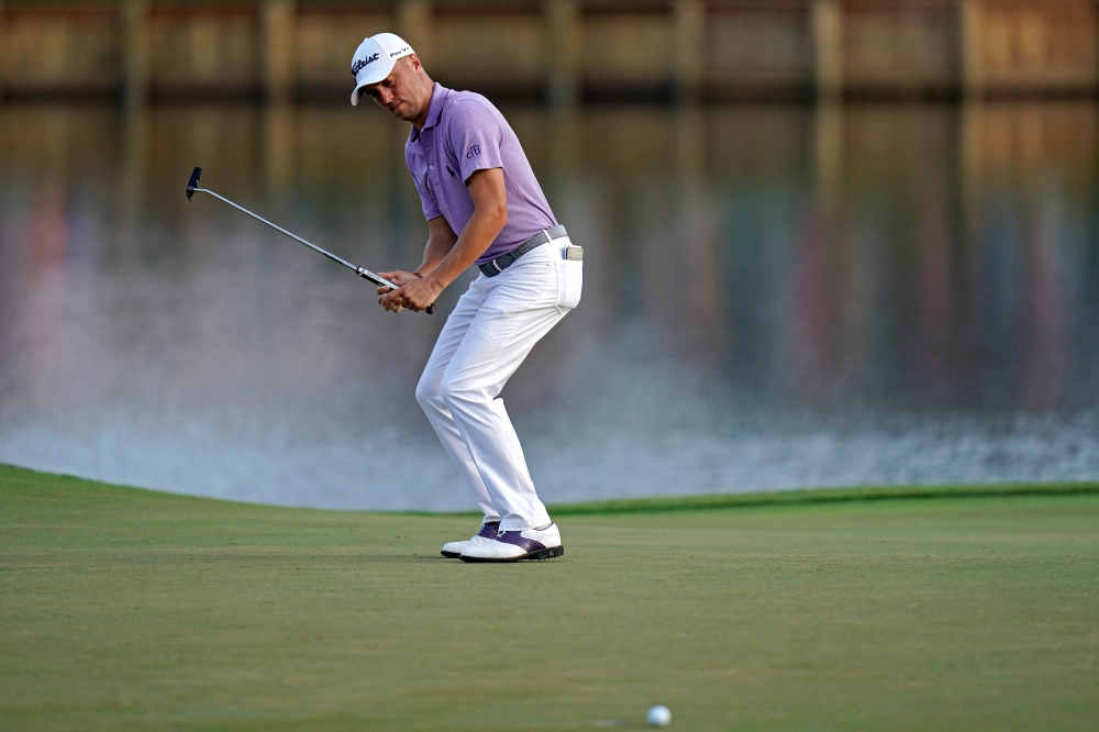 Justin Thomas reacts to his putt on the 17th green during the second round of The Player Championship golf tournament at TPC Sawgrass - Stadium Course in Ponte Vedra Beach, FL. —Reuters