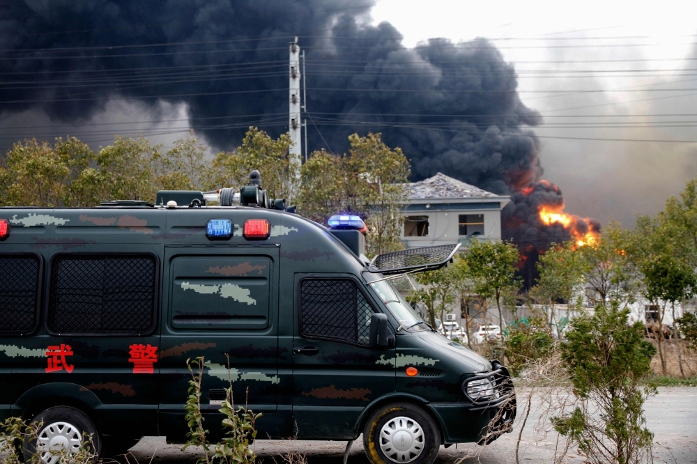 Fire and smoke rise at an explosion site in Yancheng in China’s eastern Jiangsu province on Thursday. — AFP