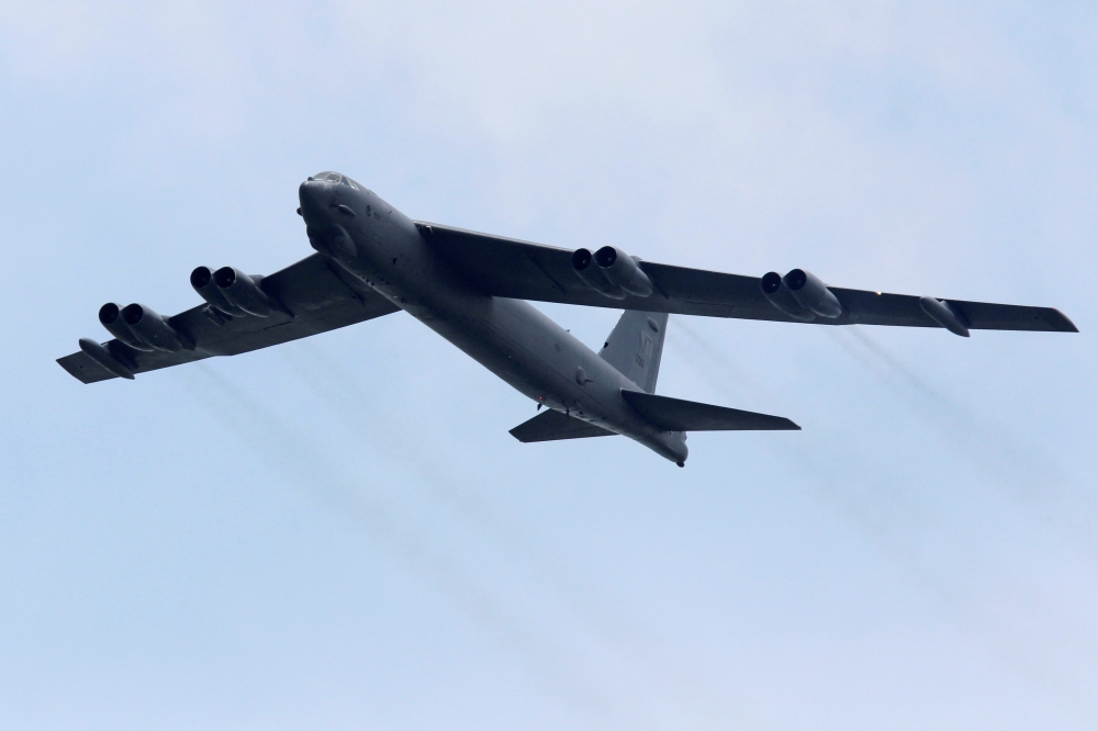 A Boeing B-52 bomber from the US Air Force Andersen Air Force Base in Guam performs a fly-over at the Singapore Airshow in Singapore in this Feb. 14, 2012 file photo. — Reuters