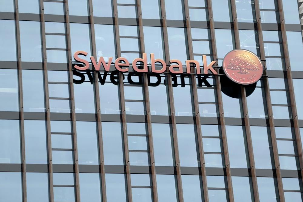Swedbank's logo is pictured on its Lithuanian headquarters in Vilnius, Lithuania, in this file photo. — Reuters