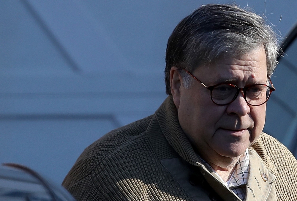 US Attorney General William Barr departs his home Saturday in McLean, Virginia. Special Counsel Robert Mueller delivered the report from his investigation into Russian interference in the 2016 presidential election to Barr on Friday and Barr is expected to brief members of Congress on the report this weekend. — AFP