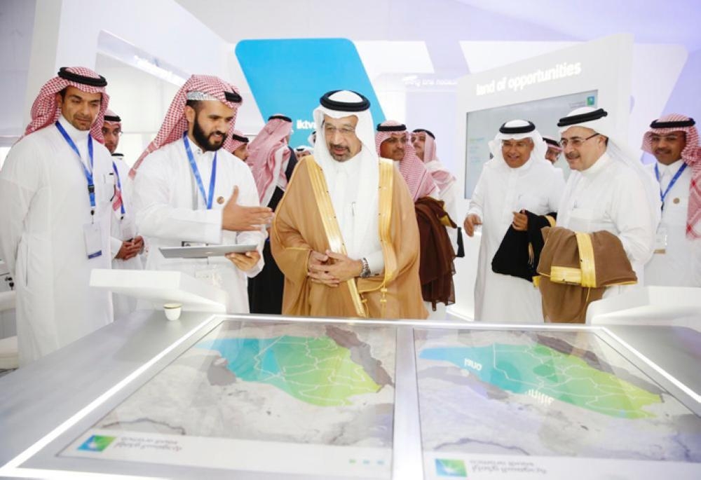Saudi Energy Minister and Chairman of Saudi Aramco Khalid Al-Falih and Minister of Commerce and Investment Dr Majid bin Abdullah Al Qasabi look at the economic development map as concerned official explain the plan