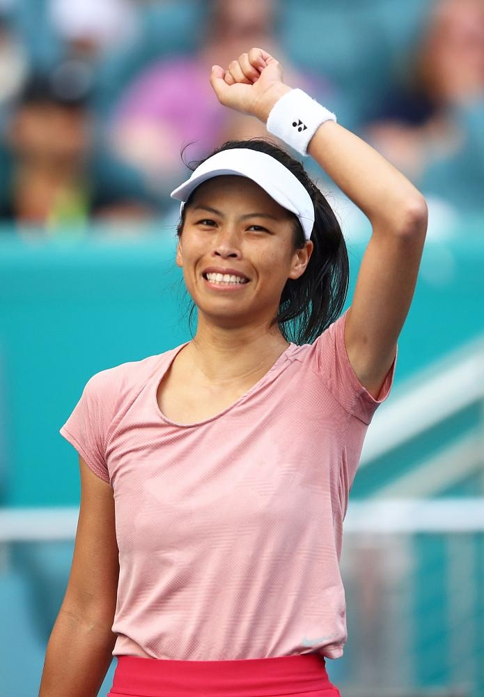 Hsieh Su-wei of Taipei celebrates after defeating Naomi Osaka of Japan at the Miami Open Tennis in Miami Gardens, Florida, Saturday. — AFP 
