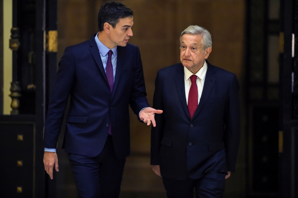 Mexican President Andres Manuel Lopez Obrador, right, and Spain’s Prime Minister Pedro Sanchez arrive to deliver a joint statement at the National Palace in Mexico City in Jan. 30, 2019 file photo. — AFP