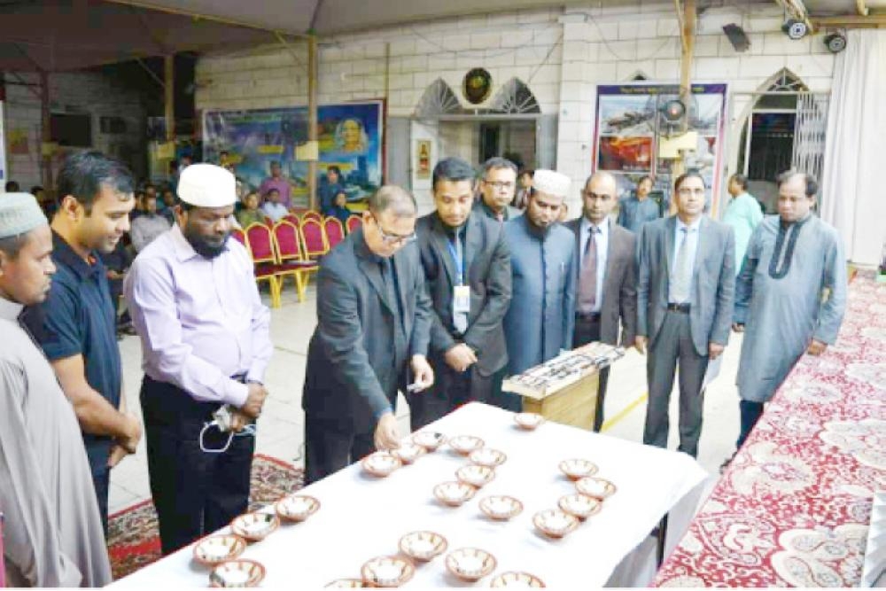 In Jeddah Consul General F.M. Borhan Uddin paying tribute to martyrs in early hours of Tuesday.
