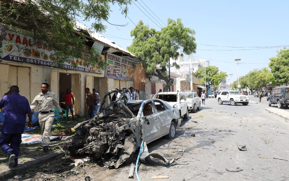 A general view shows wreckage of cars destroyed during an explosion near a hotel in Mogadishu, Somalia, on Thursday. — Reuters