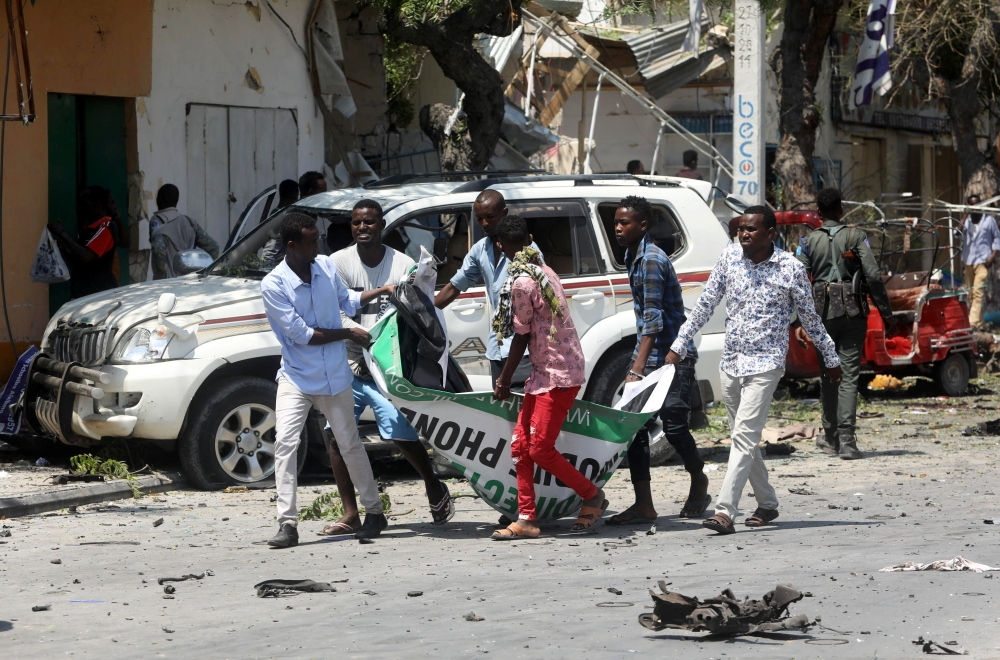 A general view shows wreckage of cars destroyed during an explosion near a hotel in Mogadishu, Somalia, on Thursday. — Reuters