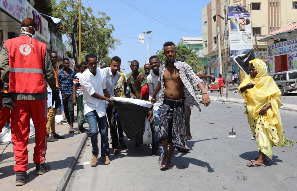 A general view shows wreckage of cars destroyed during an explosion near a hotel in Mogadishu, Somalia, on Thursday. — Reuters
