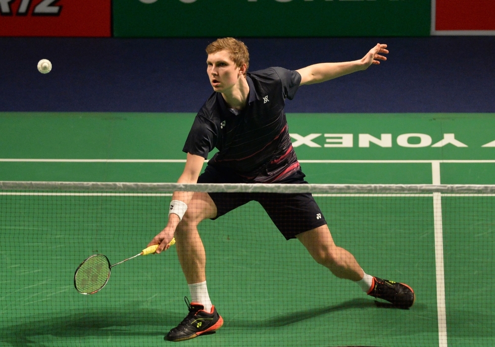 Denmark's badminton player Viktor Axelsen plays a return against Thailand badminton player  Suppanyu Avihingsanon during the men's singles second round badminton match at the Yonex-Sunrise India Open 2019 in New Delhi on Thursday. — AFP