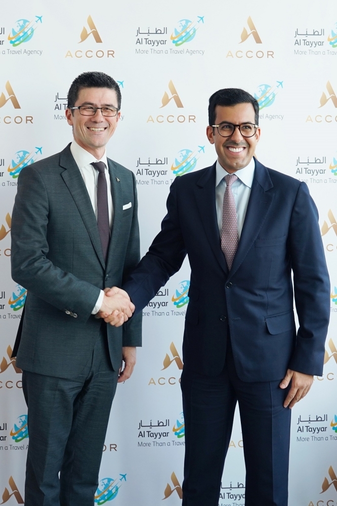 Markus Keller (left), Abdullah Al Dawood after the signing of agreement