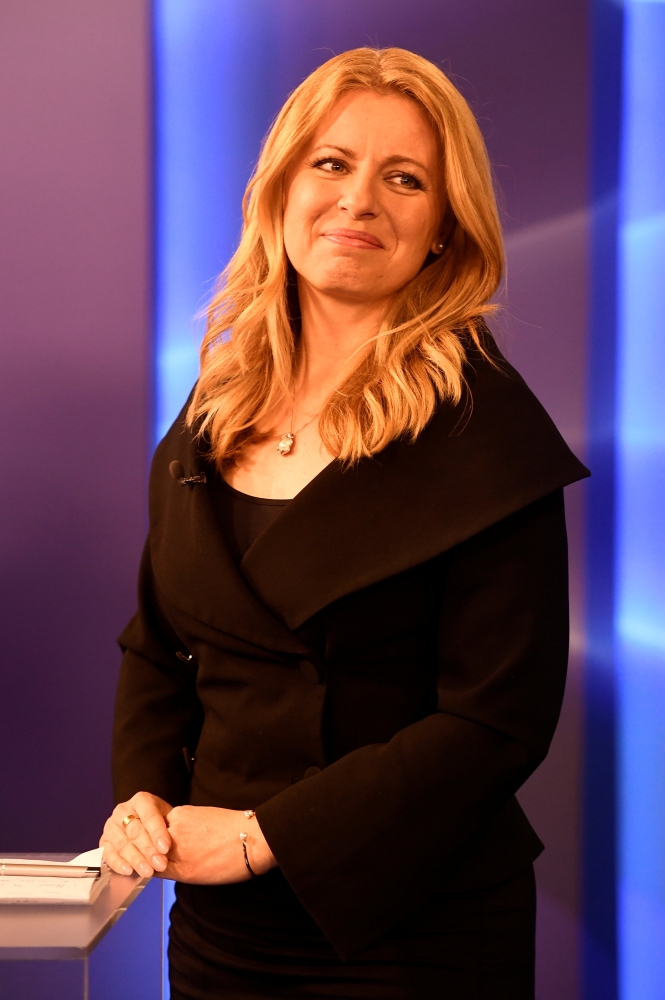 Slovakia's presidential candidate Zuzana Caputova gets ready for a televised debate with her opponent Maros Sefcovic (not pictured) ahead of an election run-off, at TV Markiza studio in Bratislava, Slovakia, this week. — Reuters