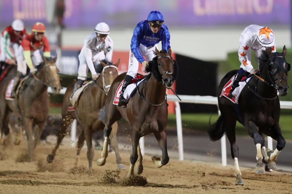 Thunder Snow, ridden by Christophe Soumillon, galloping toward victory during the Dubai World Cup at Meydan Racecourse in Dubai Saturday. — Reuters