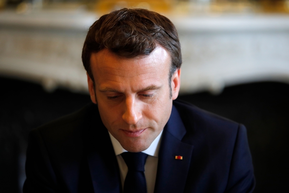 French President Emmanuel Macron meets French representatives of the Ibuka association for the memory of Rwanda’s genocide, two days ahead of the 25th anniversary of the 1994 genocide, at the Elysee presidential Palace in Paris, on Friday. — AFP