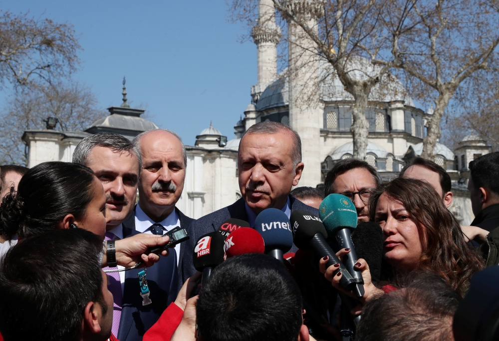 Turkish President Tayyip Erdogan talks to media in Istanbul, Turkey, on Friday. — Reuters