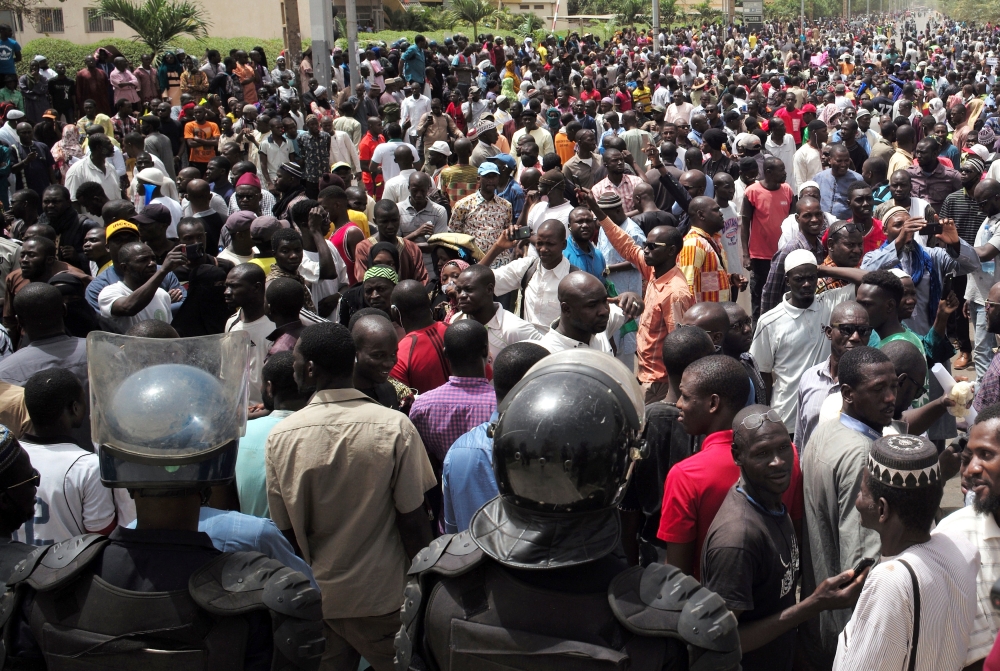 People gather to protest the government and international forces’ failure to stem rising ethnic and militant violence in the Malian capital of Bamako on Friday. — Reuters