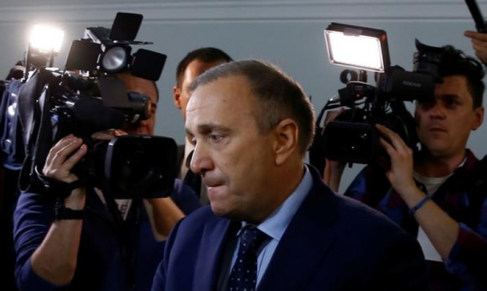 Grzegorz Schetyna of Civic Platform walks prior to a media conference at the Parliament in Warsaw in this file photo. — AFP