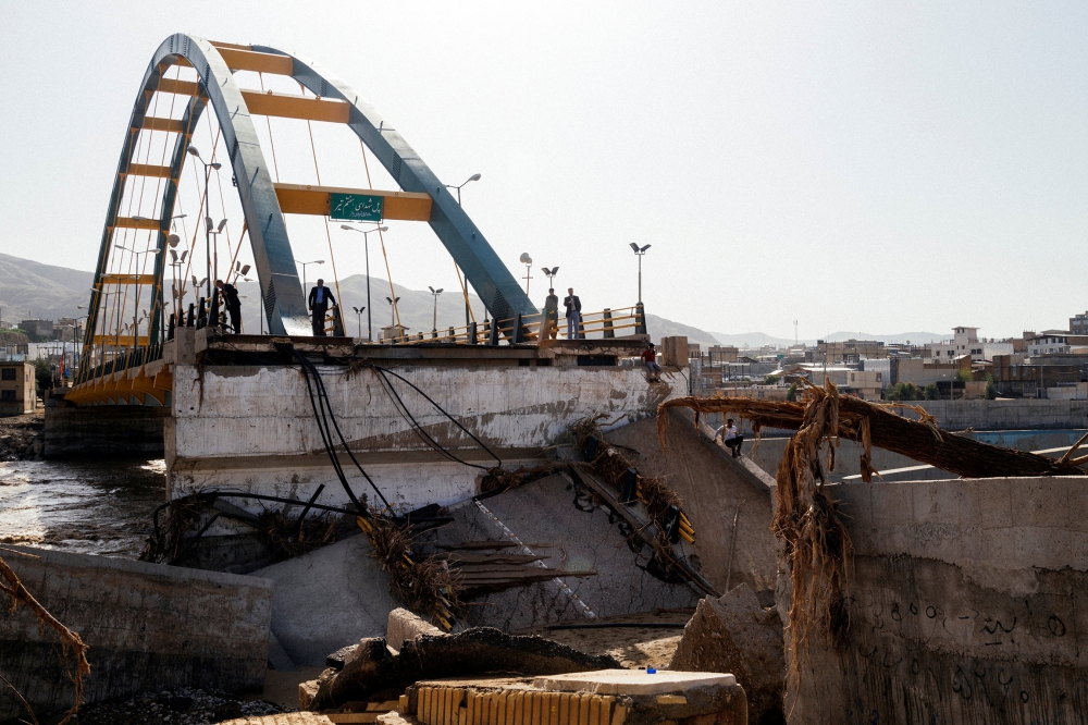 A bridge destroyed by flood is seen in Lorestan province, Iran. — Reuters