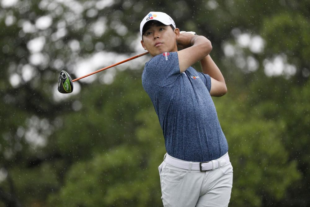 Kim Si-woo watches his drive on the second hole during the third round of the Valero Texas Open Golf Tournament at TPC San Antonio Saturday. —  Reuters 