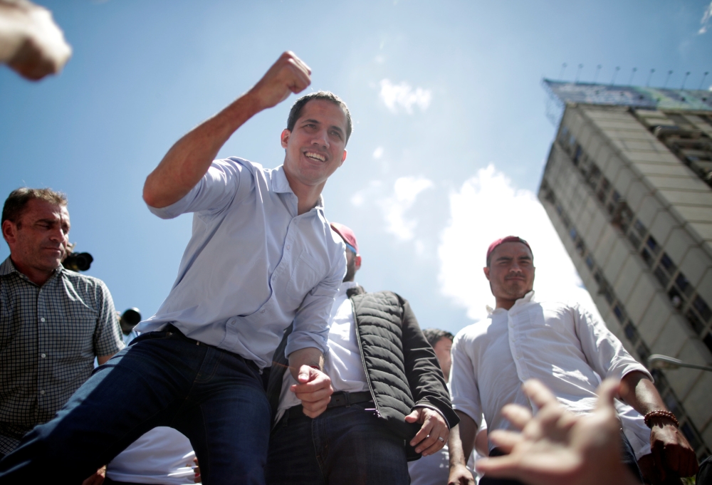 Venezuelan opposition leader Juan Guaido, who many nations have recognized as the country's rightful interim ruler, attends a rally against President Nicolas Maduro's government in Caracas, Saturday. — Reuters