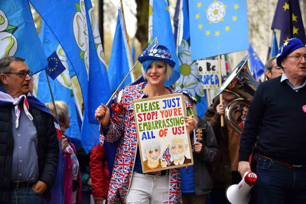 Anti-Brexit demonstrators from Yorkshire demonstrate outside the Houses of Parliament in central London on Monday. — AFP