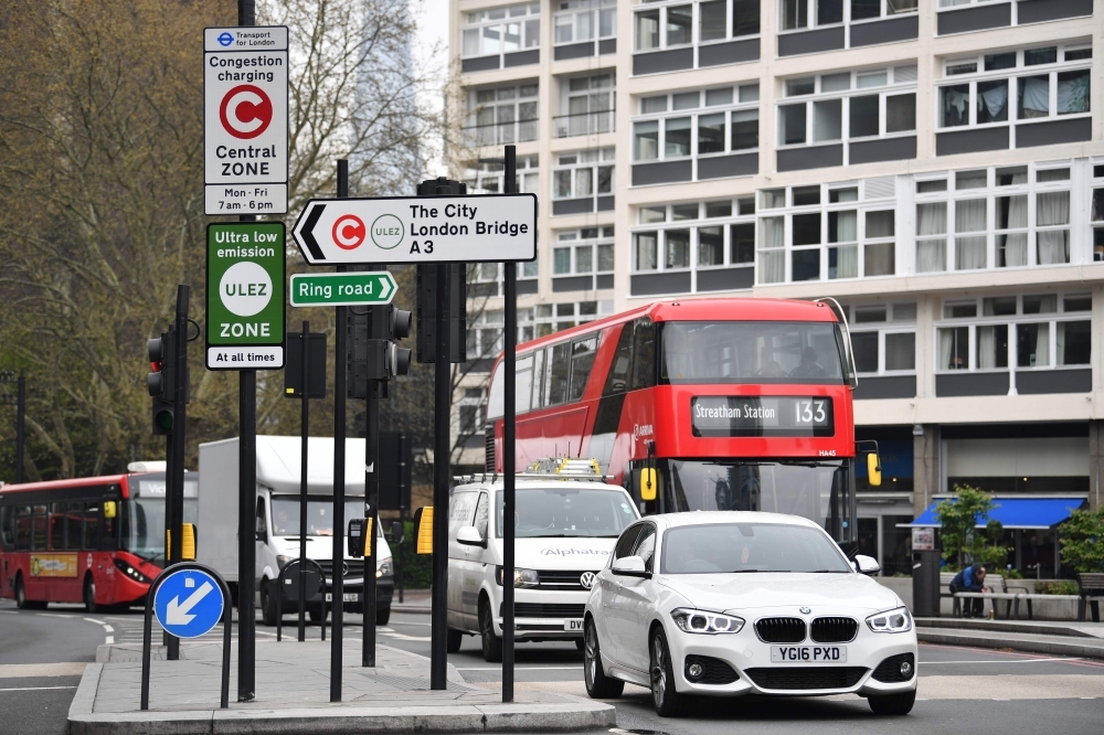 New signs for the ultra-low emission zone (Ulez) are pictured in central London on Monday. — AFP