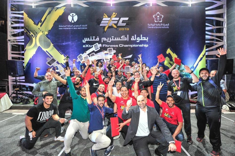 Trainers and contestants with Prince Khaled Bin Al Waleed