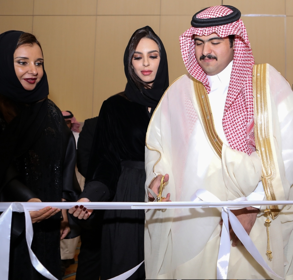 Prince Faisal Bin Saad Bin Saud Bin Mohammed Bin Abdulaziz Al Saud cuts the ceremonial ribbon at the inaugural of Salon des Grandes Complications in Riyadh
