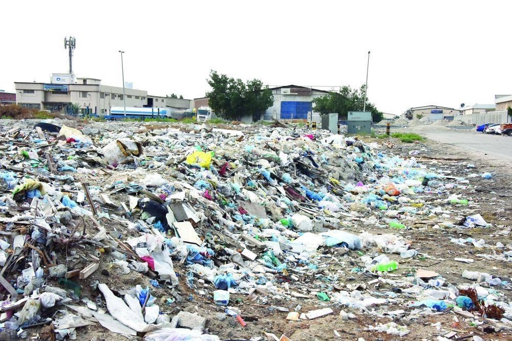 


Garbage is dumped on an empty plot in the industrial area on Tarout Island in Qatif governorate.