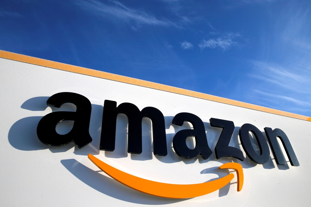 The logo of Amazon is seen at the company logistics center in Boves, France, in this file photo. — Reuters