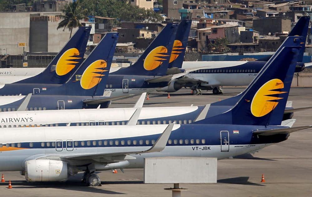 Jet Airways aircraft are seen parked at the Chhatrapati Shivaji Maharaj International Airport in Mumbai, India, on Thursday. — Reuters