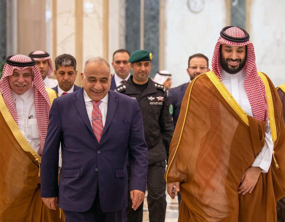 Crown Prince Muhammad Bin Salman, deputy premier and minister of defense, receiving Iraqi Prime Minister Adil Abdul Mahdi in Riyadh on Wednesday evening. — SPA