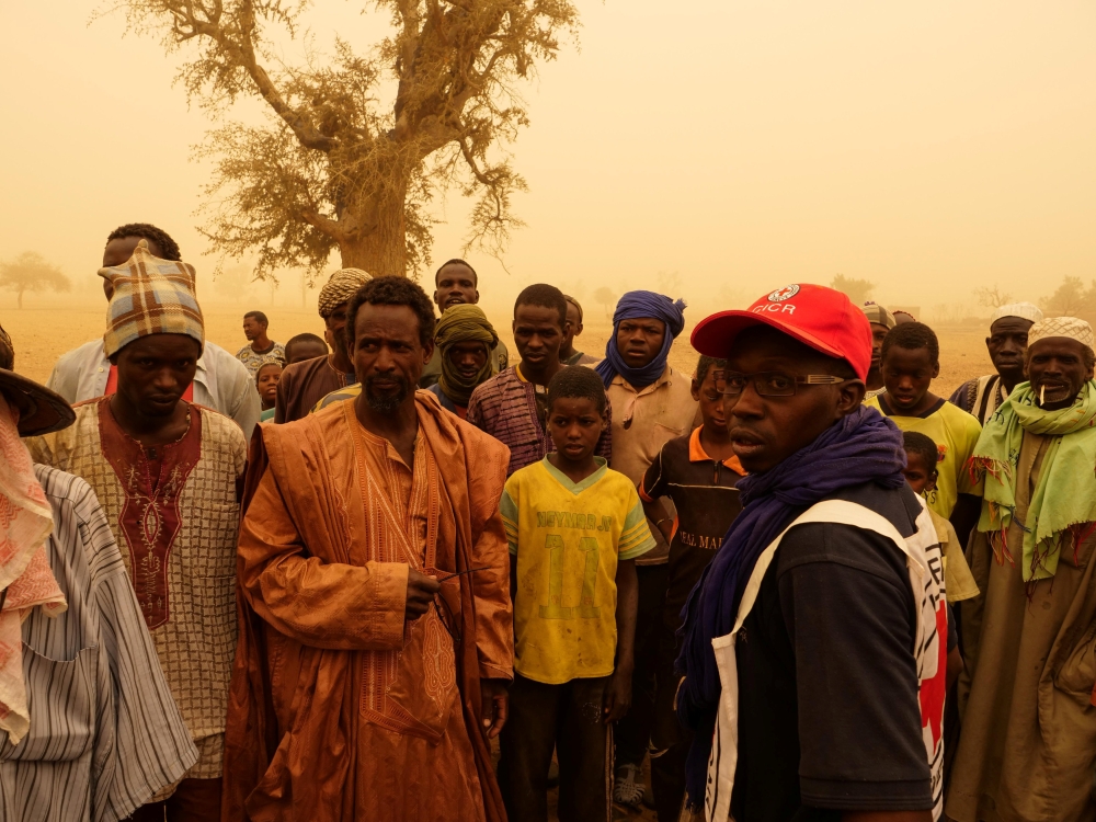 Villagers are seen following the March 23 attack by militiamen that killed about 160 Fulani people, in Ogossagou Village, Mali, in this March 31, 2019 file photo. —  Reuters