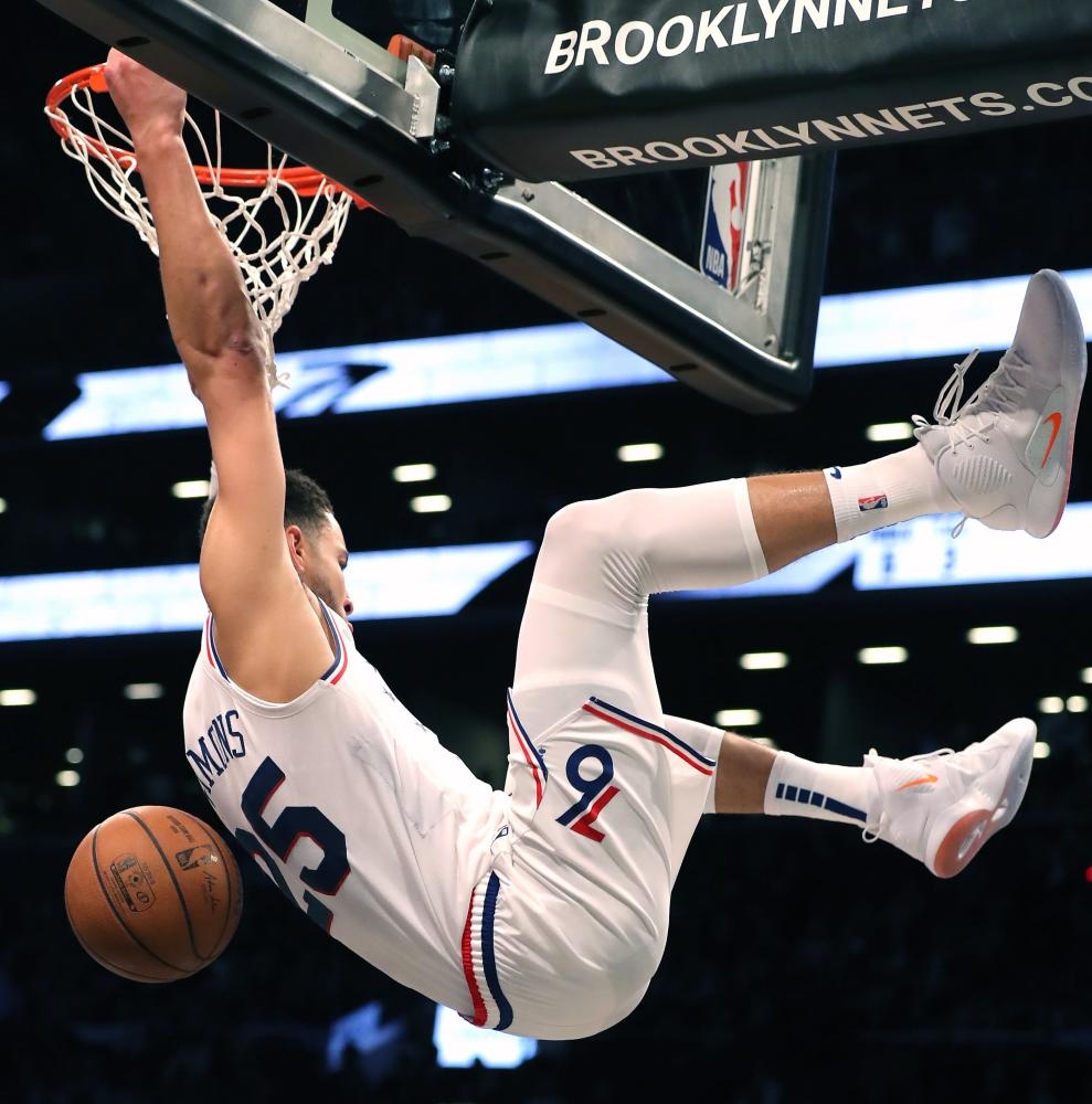 Ben Simmons No. 25 of the Philadelphia 76ers dunks in the fourth quarter against the Brooklyn Nets during game three of Round One of the 2019 NBA Playoffs at Barclays Center on Thursday in the Brooklyn borough of New York City. — AFP