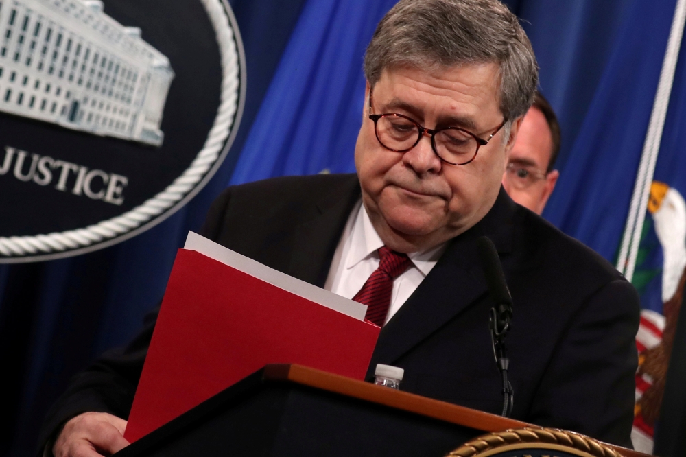 US Attorney General William Barr departs after speaking at a news conference to discuss Special Counsel Robert Mueller’s report on Russian interference in the 2016 US presidential race in Washington on Thursday. — Reuters