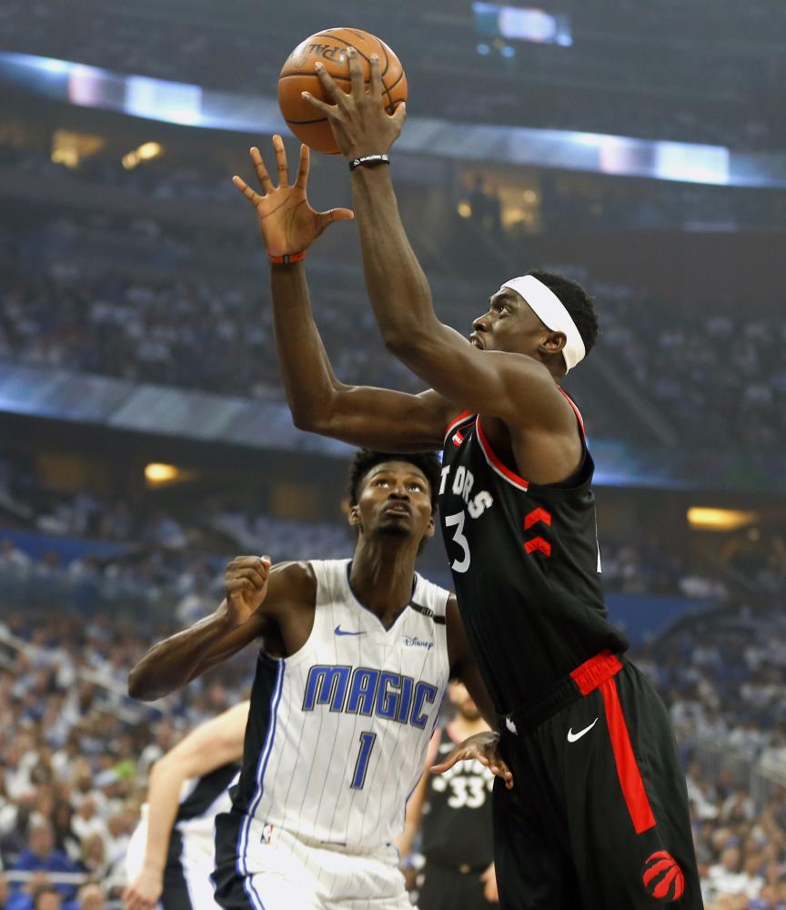 Toronto Raptors’ forward Pascal Siakam drives to the basket against Orlando Magic’s forward Jonathan Isaac during Game 3 of the first round of the 2019 NBA Playoffs at Amway Center in Orlando Friday. — Reuters
