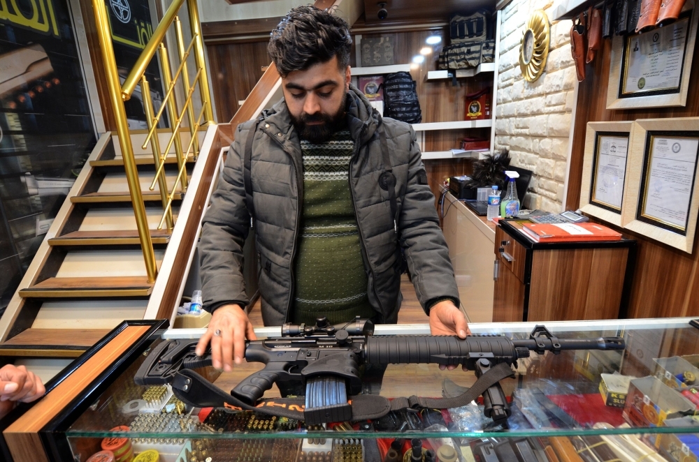 Rifles and other items are diplayed in a gun shop in the northern Iraqi city of Mosul. Hunting rifles, pistols and towers of ammunition magazines: gun stores are popping up in Mosul, where residents are keen to own personal firearms in the unpredictable aftermath of Daesh (the so-called IS) rule. — AFP photos