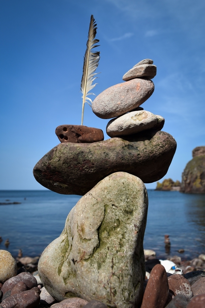Pictures show a balanced sculpture built during the European Stone Stacking Championships 2019 in Dunbar, Scotland. — AFP