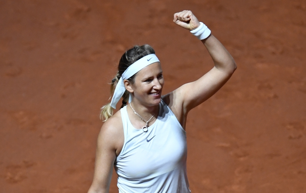 


Belarus’ Victoria Azarenka celebrates after winning her match against Russia’s Vera Zvonareva at the WTA Tennis Grand Prix in Stuttgart Wednesday. — AFP