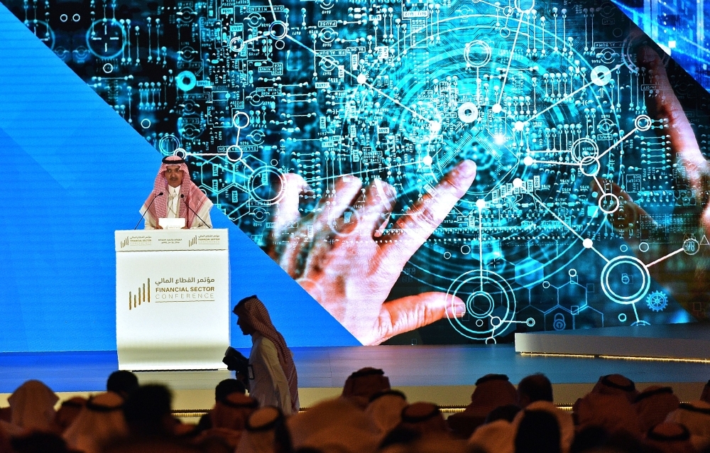 Saudi Finance Minister Mohammed Al-Jadaan addresses the Financial Sector Conference in Riyadh on Wednesday.  The event is organized by the government bodies overseening the implementation of the Financial Sector Development Program, which are the Ministry of Finance, the Saudi Arabian Monetary Authority (SAMA) and the Capital Market Authority (CMA). — AFP
